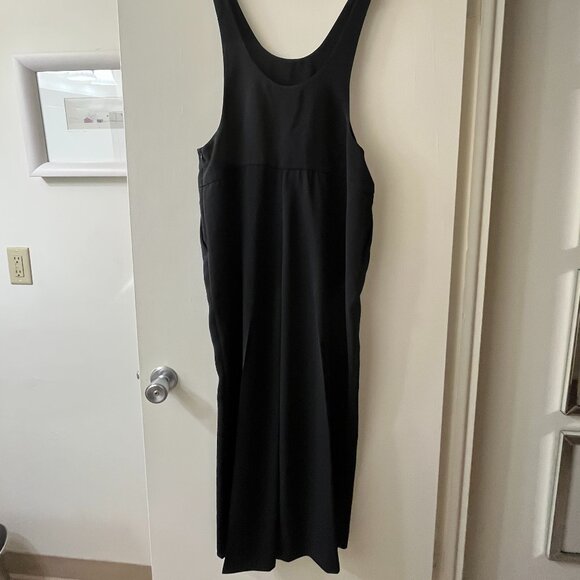 NWT EXPRESS Womens Black Wide Leg Jumpsuit Medium Petite Pockets Bow Tie Straps - Picture 1 of 6